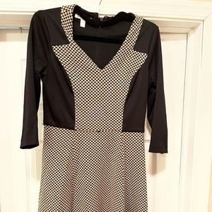 Polyester blend, knee length dress. V-neck